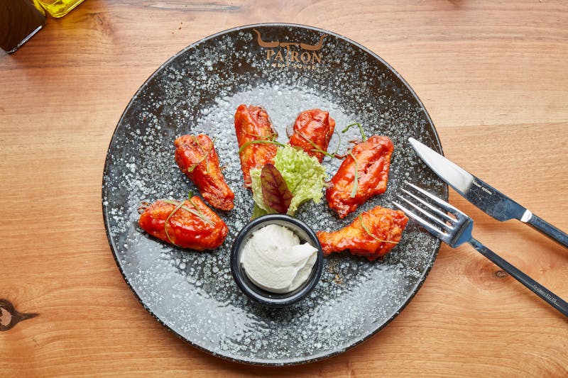 Classic Buffalo east coast wings tossed in spicy buffalo sauce